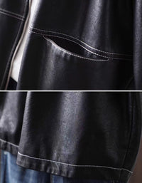 Details of Women's black faux leather bomber jacket styled with a white top and black jeans on a model