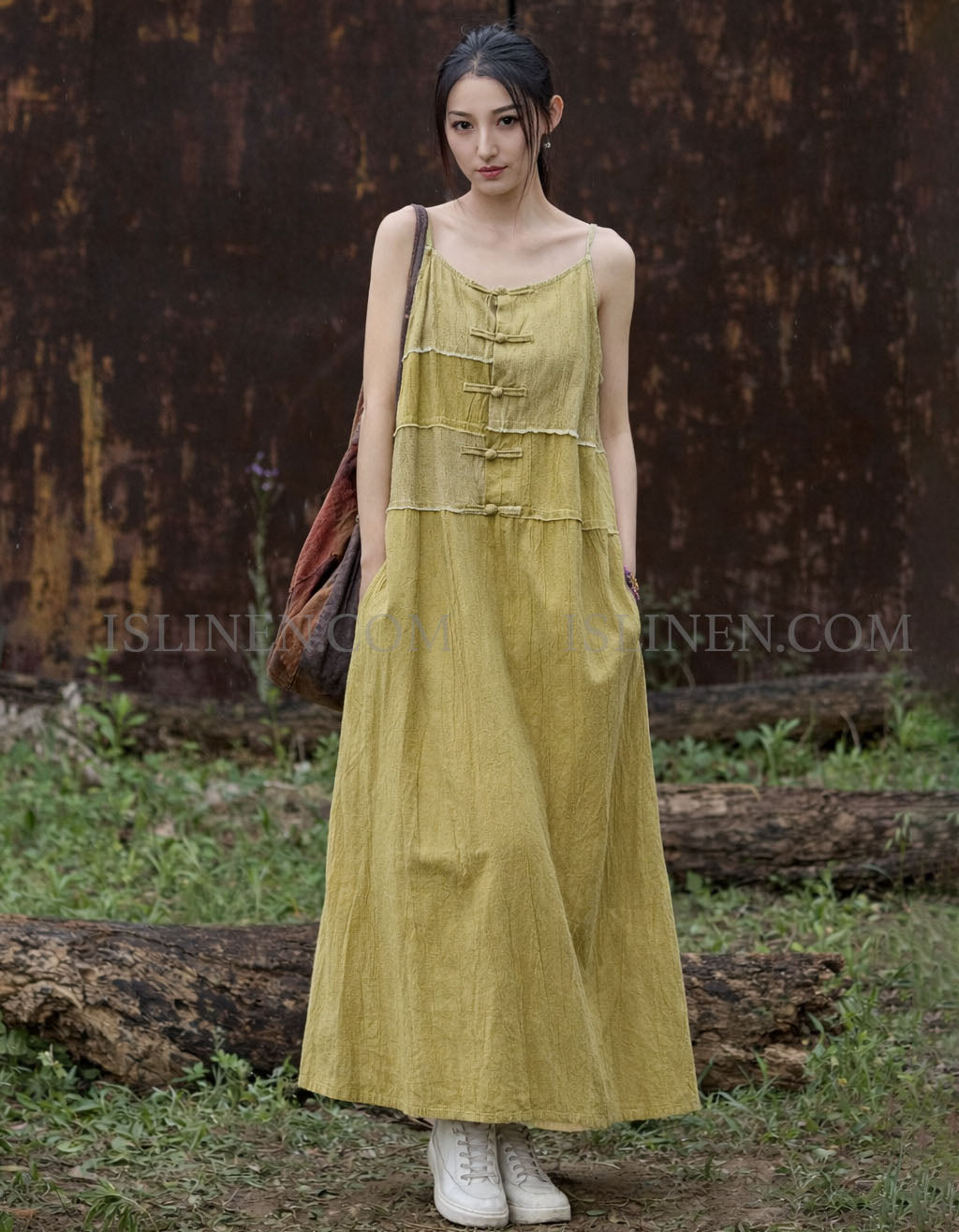 Woman wearing vintage boho linen maxi dress styled for summer outdoor look