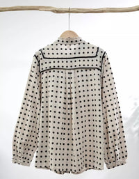 Button front women blouse with pleated design and polka dots