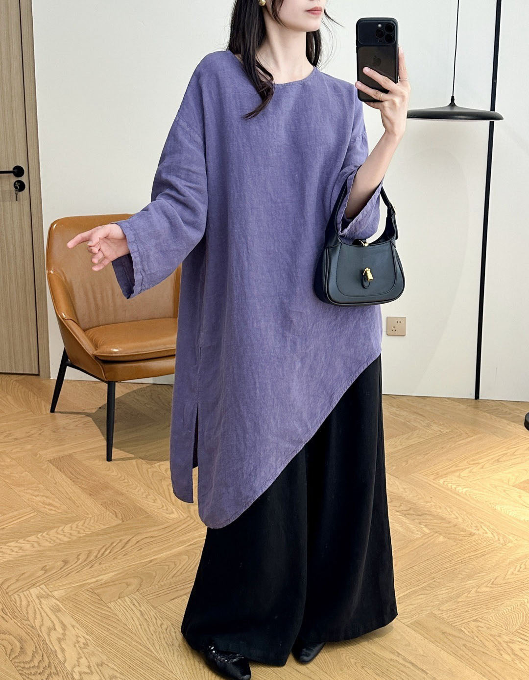 Women's boho linen tunic top styled with wide leg pants