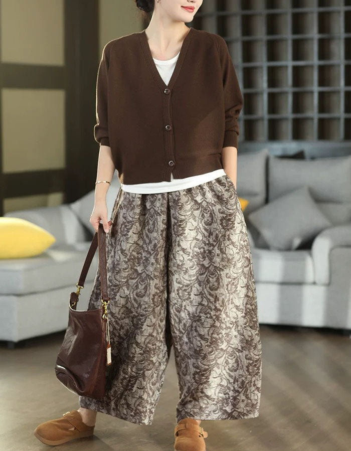 Women wearing blue printed wide leg pants with vintage floral pattern