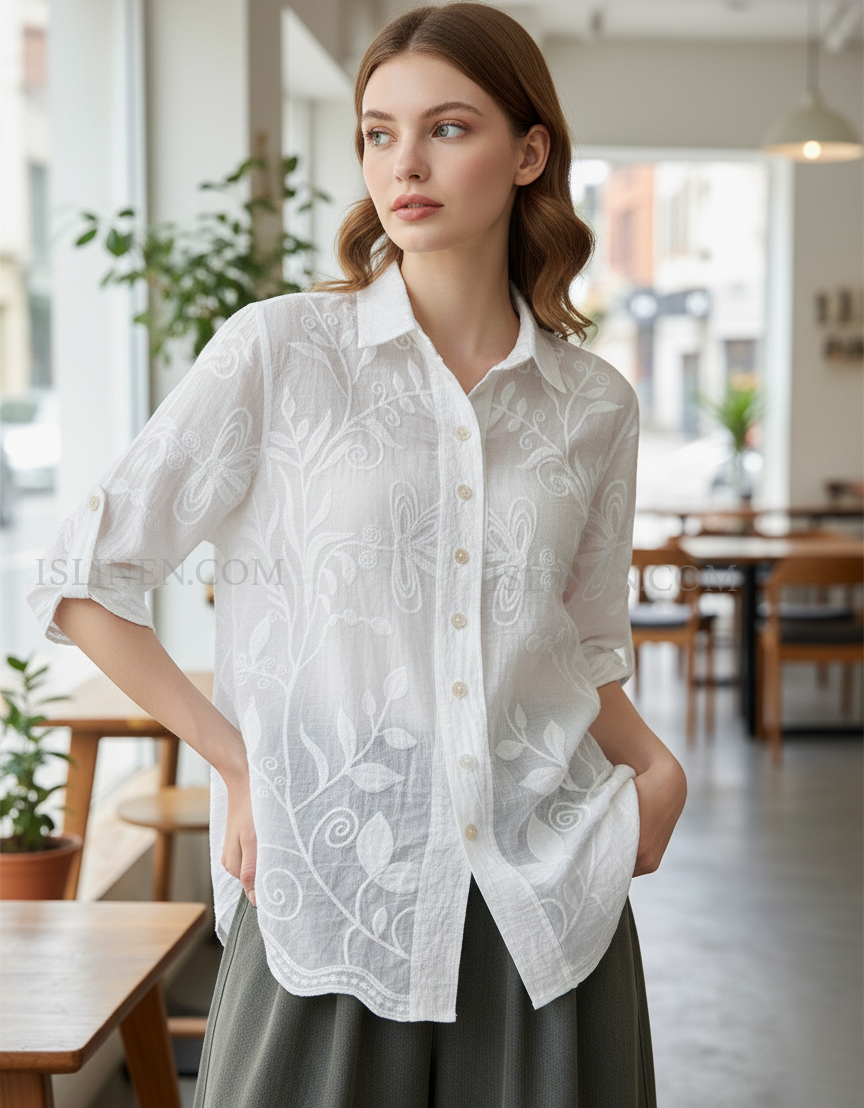 Breathable embroidered white shirt women indoor setting