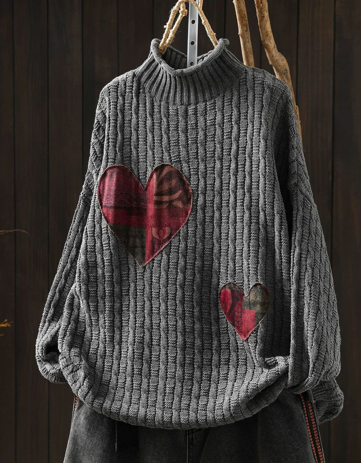 Gray women's rib knit sweater with tartan heart patches