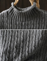 Close-up of heart patch details on women's knit sweater