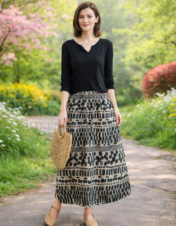 Black and beige patterned women’s casual midi skirt outdoors