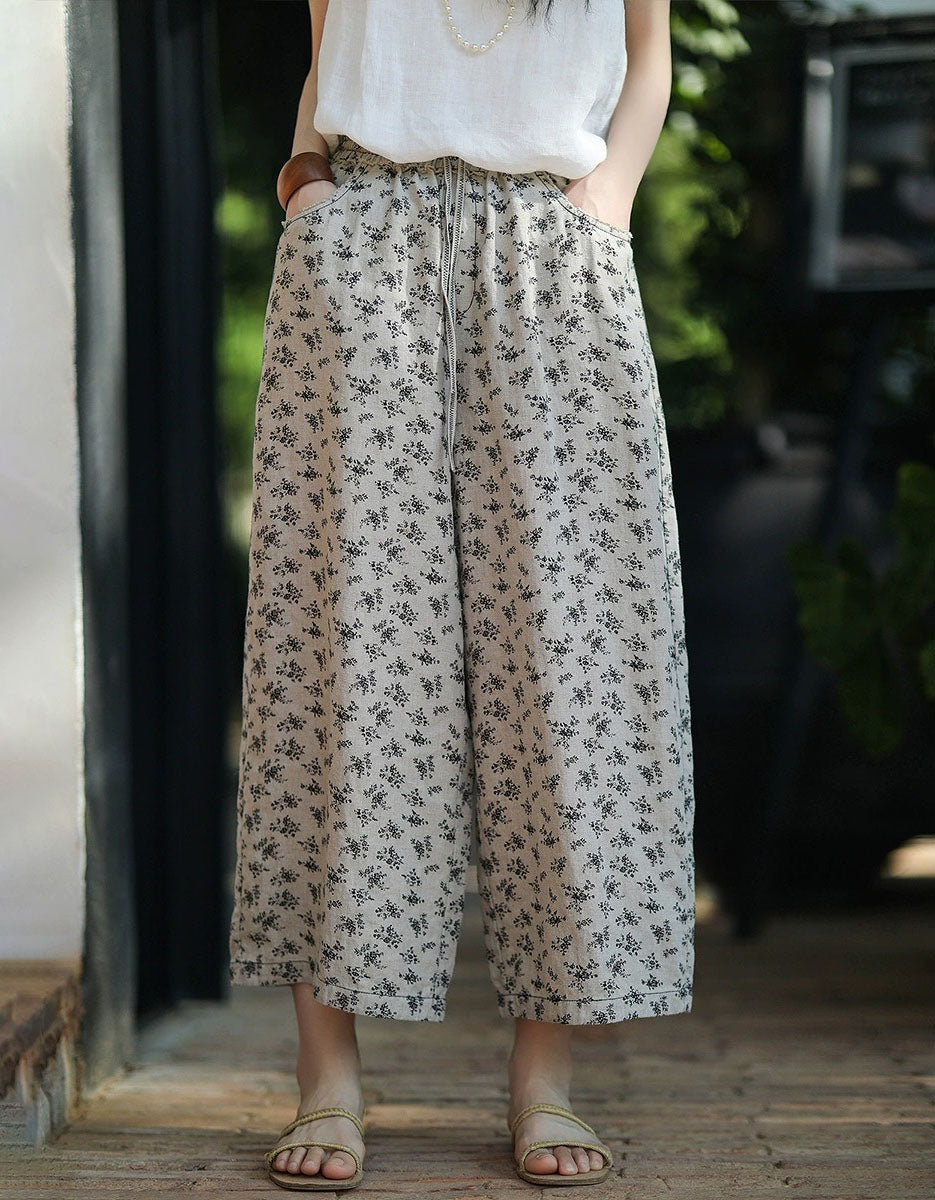 Women wearing floral linen wide leg pants with elastic waist