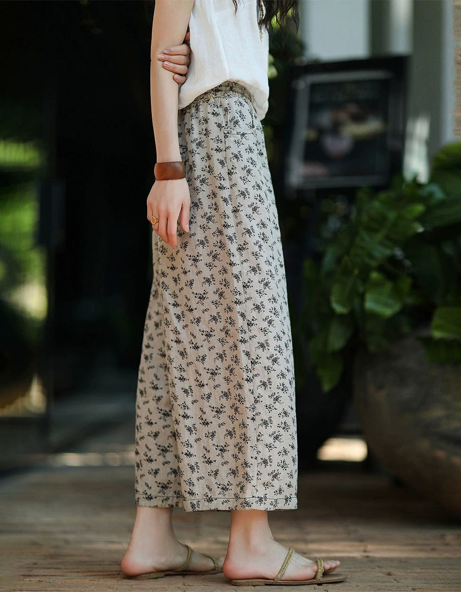 Vintage style floral linen trousers paired with casual sandals