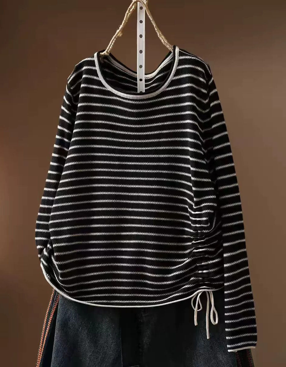 Black striped women's knit top with round neckline and long sleeves