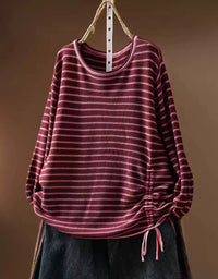 Red striped women's knit top with round neckline and long sleeves