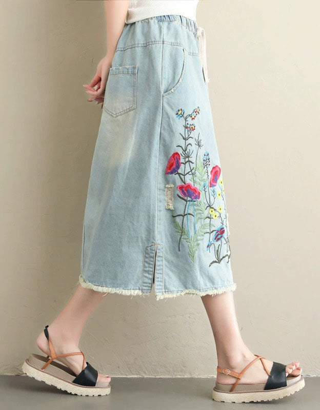 women’s light blue drawstring denim skirt with floral embroidery side view