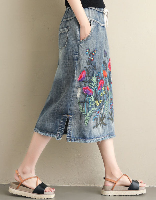 women’s blue drawstring denim skirt with floral embroidery side view