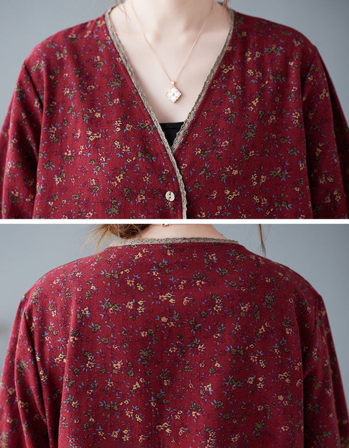 Close-up of v-neckline design on women’s floral button front top