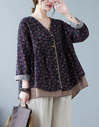 Side view of navy floral pattern on women’s button-up v-neck top in navy blue