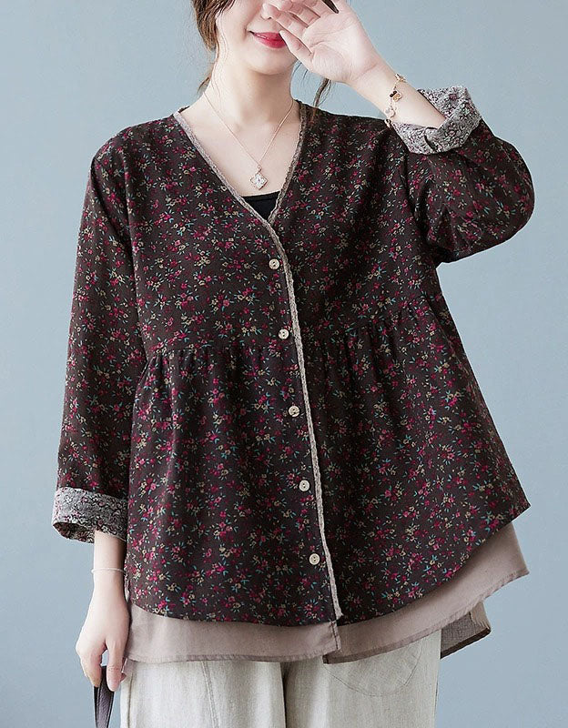 Front view of women’s floral v-neck top with relaxed fit and long sleeves