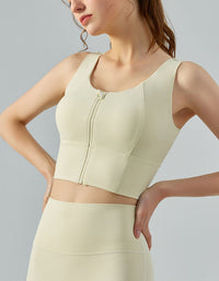 Woman wearing a beige compression garment against a gray background