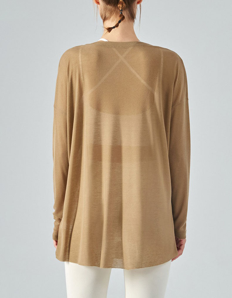 Brown long-sleeve top worn by a person on a light gray background back view