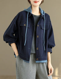 Women’s denim jacket with a hoodie and button-front detail, styled casually