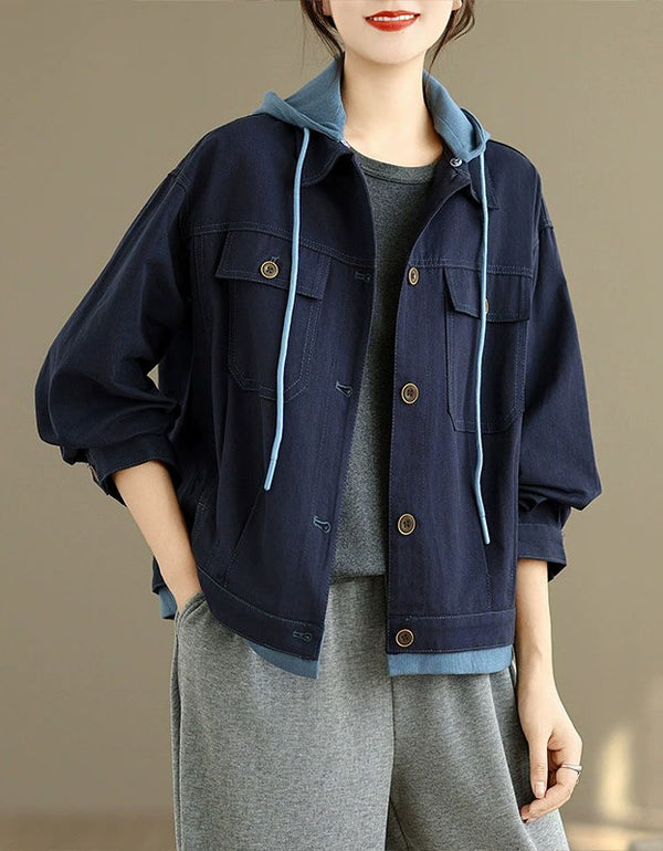 Women’s denim jacket with a hoodie and button-front detail, styled casually