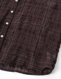 Close-up of women loose fit plaid blouse breathable comfortable fashion shirt