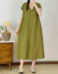 Minimalist V-neck linen blend dress styled with flats