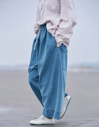 Side view of women relaxed fit wide leg cotton pants