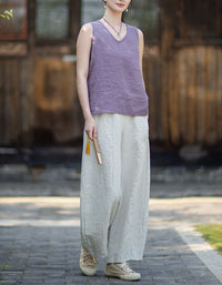 Minimalist linen V-neck tank top paired with wide leg linen pants