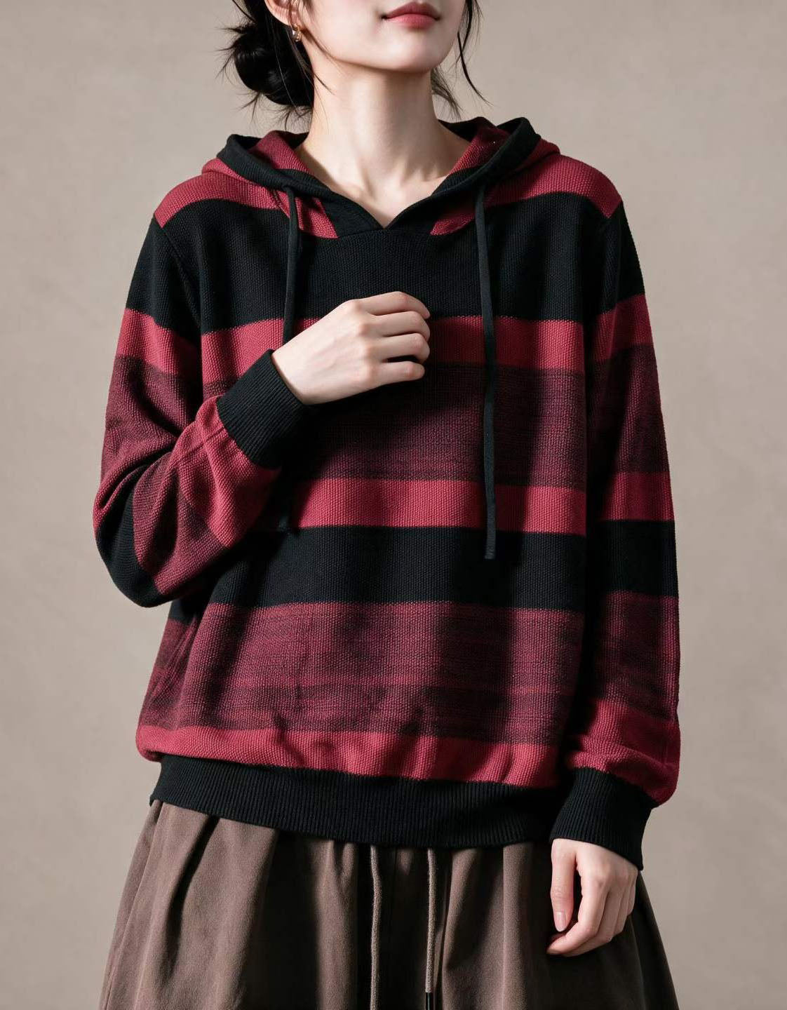 Olive green and brown striped knit hoodie with drawstring hood