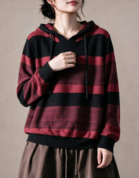 Olive green and brown striped knit hoodie with drawstring hood