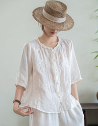 Women's relaxed fit linen blouse with ruffle neckline