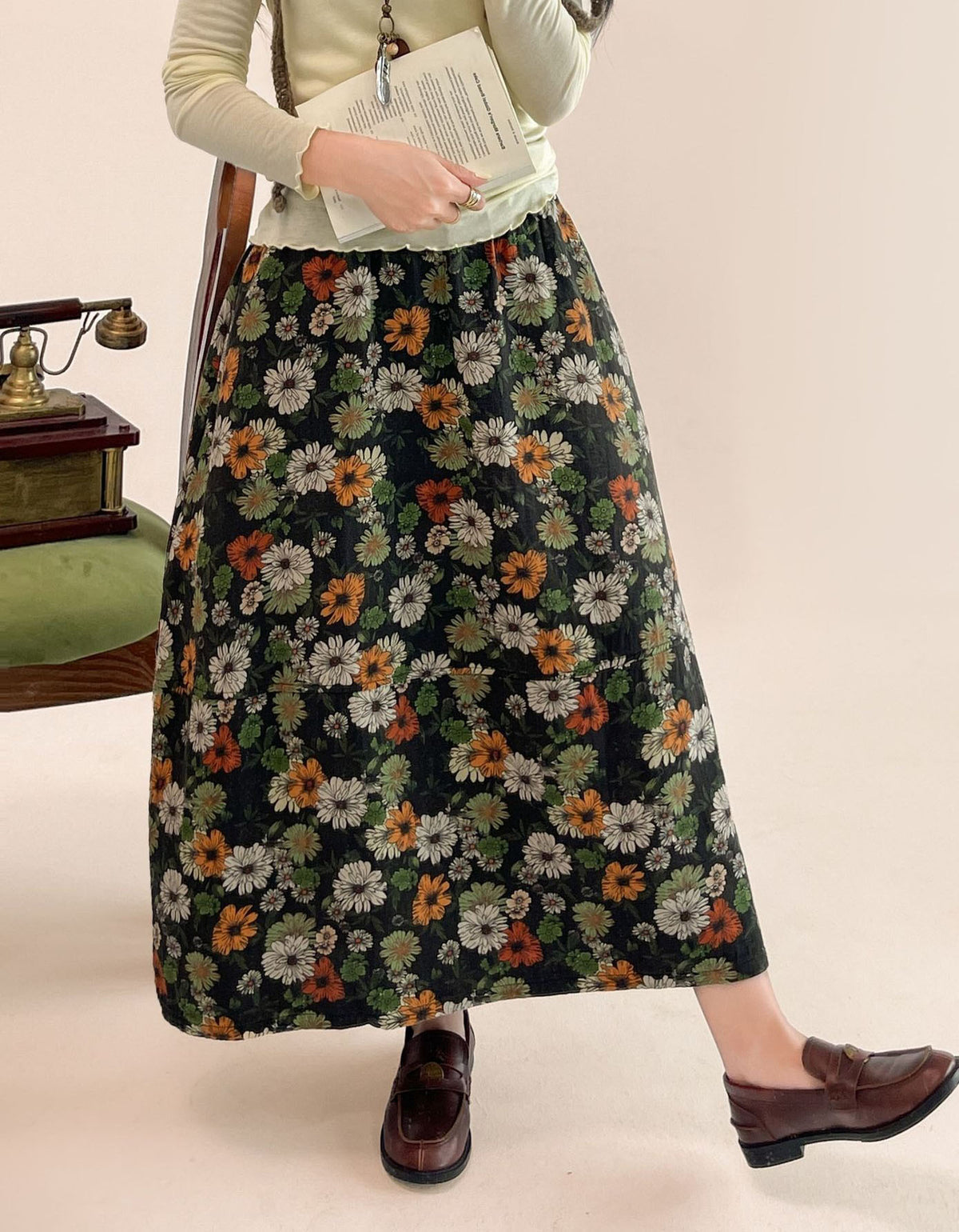Woman wearing women's vintage floral midi skirt with elastic waist