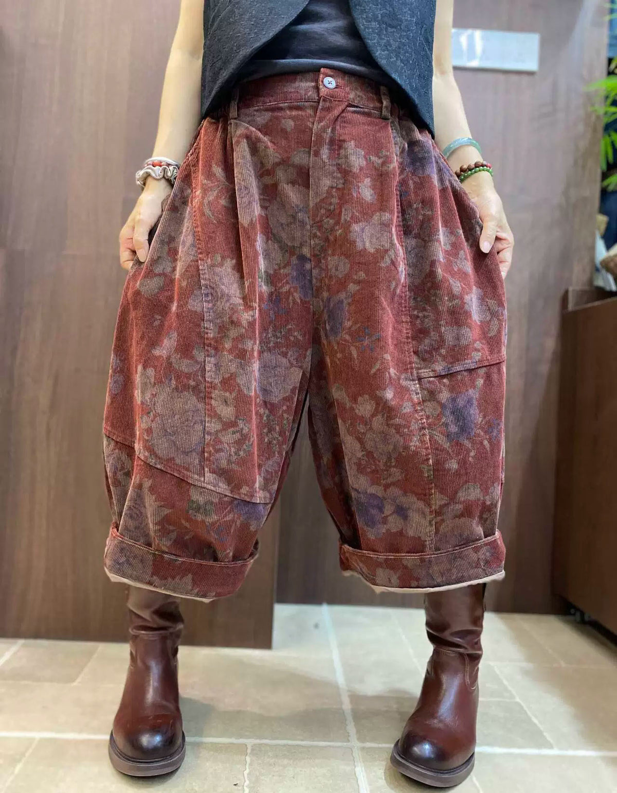 Women’s retro floral print cropped pants styled with brown boots