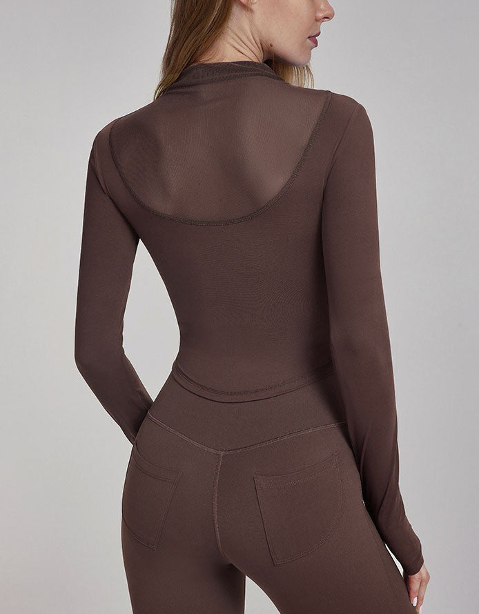 Brown long-sleeve top and pants on a plain background