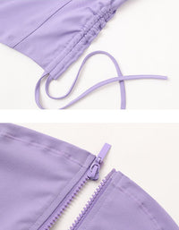 Purple yoga jacket set with a top and bottom on a white background close-up