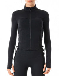 Black athletic jacket worn by a person on a white background