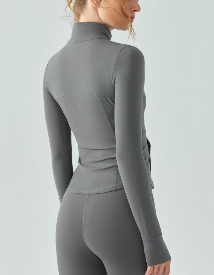 Gray long-sleeve top and leggings on a plain background back view
