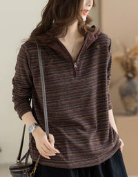 Women's relaxed striped half-zip pullover styled with white wide-leg trousers