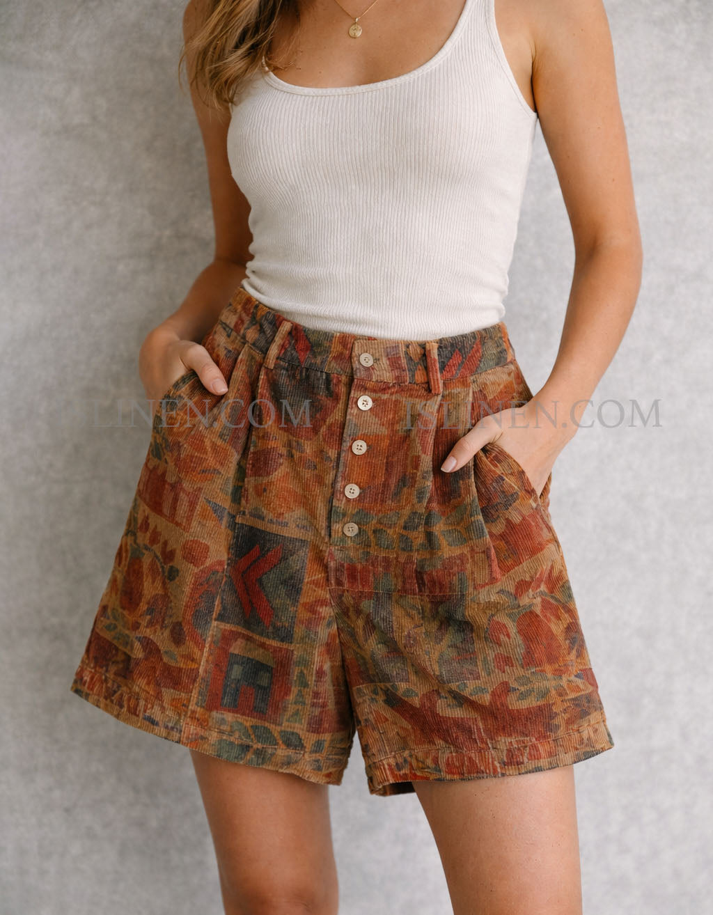 Women’s printed corduroy shorts with button front and floral design