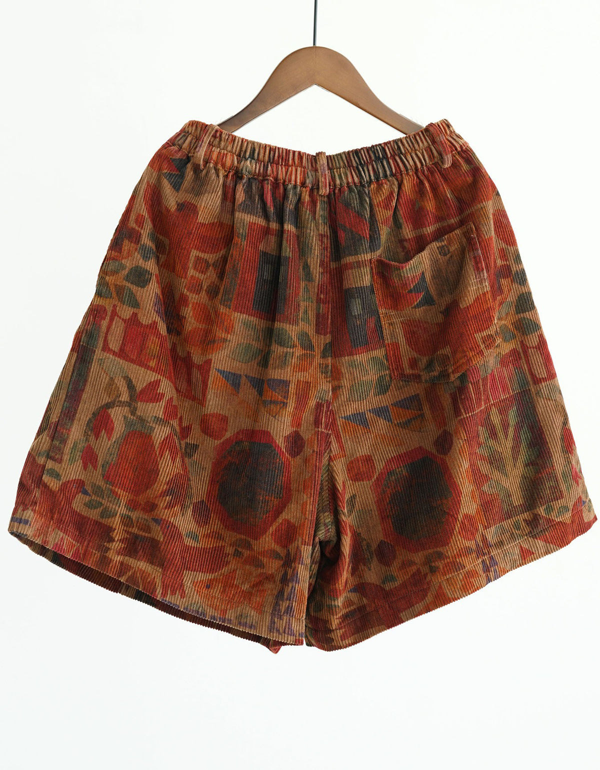 Back view of stylish printed corduroy shorts with button closure