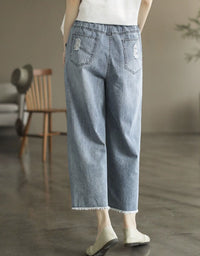 Ankle-length embroidered denim pants for women with elastic waistband back view