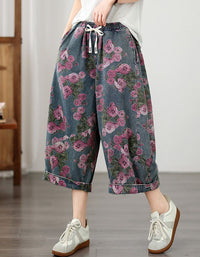 Casual streetwear outfit with floral rose denim pants and sneakers