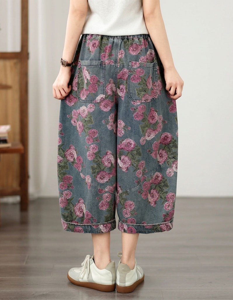 Back view of women's elastic waist floral denim wide leg trousers