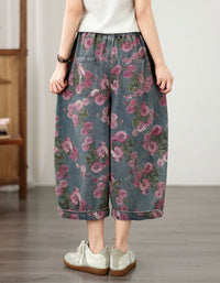 Back view of women's elastic waist floral denim wide leg trousers