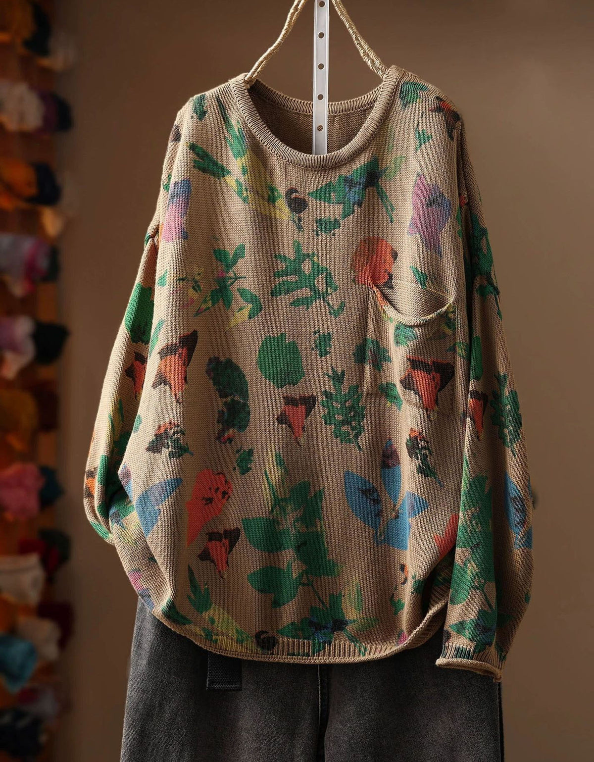 Women’s khaki beige floral print knit sweater with crew neck and long sleeves