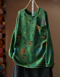 Women’s vintage green floral print knit sweater with crew neck and long sleeves