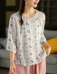 Women’s breathable linen blouse in light blue with subtle print, relaxed fit casual top for everyday wear