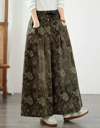 Vintage inspired botanical print pants with wide leg silhouette and side pockets