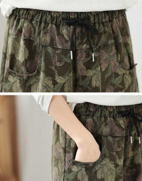 Women's relaxed floral palazzo pants featuring an elegant vintage garden print
