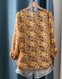 Women's floral print V-neck lightweight summer blouse with button front design