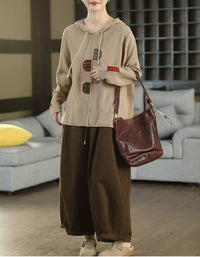 Women's long sleeve khaki hooded sweater with relaxed vintage-inspired design
