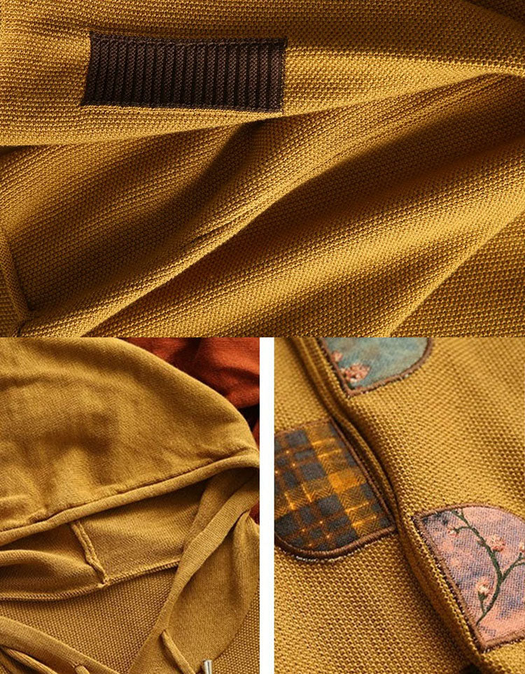 Close-up of colorful patchwork appliqué details on women's vintage knit sweater